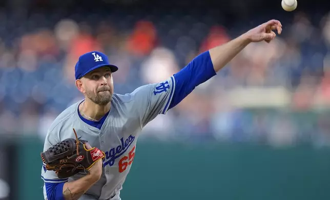 Los Angeles Dodgers starting pitcher James Paxton throws during the first inning of the team's baseball game against the Washington Nationals at Nationals Park, Tuesday, April 23, 2024, in Washington. (AP Photo/Alex Brandon)