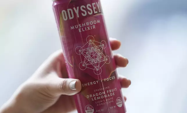 A can of Odyssey mushroom elixir is shown, Wednesday, April 10, 2024, in New York. Hundreds of brands of functional beverages - drinks designed to do more than just taste good or hydrate - are vying for consumers’ attention. (AP Photo/John Minchillo)