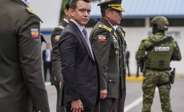 FILE - Ecuador President Daniel Noboa attends a ceremony to deliver equipment to police, at the Gral. Alberto Enriquez Gallo police school in Quito, Ecuador, Jan. 22, 2024. Ecuadorians head to the polls Sunday, April 21, 2024, in a referendum touted by Noboa as a way to crack down on criminal gangs behind a spiraling wave of violence. (AP Photo/Dolores Ochoa, File)