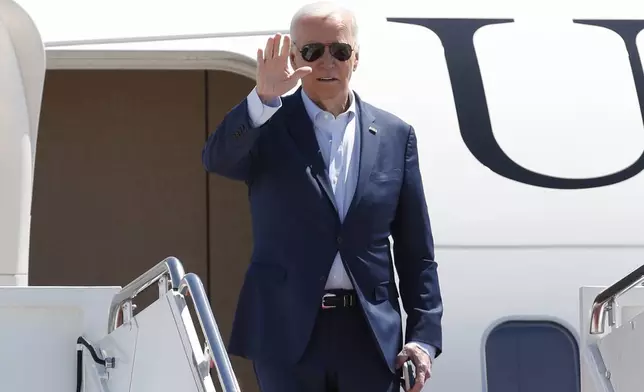 President Joe Biden waves as he boards Air Force One, Tuesday, April 16, 2024, at Andrews Air Force Base, Md. Biden is headed to Pennsylvania. (AP Photo/Luis M. Alvarez)