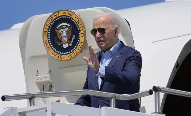 President Joe Biden waves as he arrives on Air Force One at Wilkes-Barre Scranton International Airport, Tuesday, April 16, 2024, in Scranton, Pa. (AP Photo/Alex Brandon)