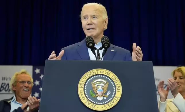 President Joe Biden speaks at a campaign event, Thursday, April 18, 2024, in Philadelphia. Pictured in background are members of the Kennedy family Joe Kennedy III, left, and Rory Kennedy. (AP Photo/Alex Brandon)
