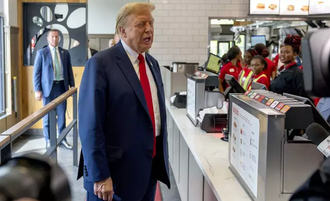 Republican presidential candidate former President Donald Trump visits a Chick-fil-A eatery, Wednesday, April 10, 2024, in Atlanta. (AP Photo/Jason Allen)
