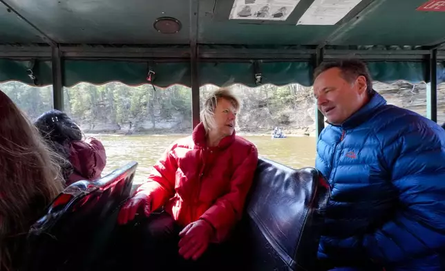 Wisconsin Democratic U.S. Sen. Tammy Baldwin talks to Dan Gavinski while riding a Wisconsin Dells Duck during a campaign stop Friday, March 29, 2024, in Wisconsin Dells, Wis. The stop was part of her campaign launch tour in a race against Republican Eric Hovde the could determine who has majority control of the Senate. The Wisconsin Senate race between Democratic Sen. Tammy Baldwin and Republican Eric Hovde is setting up as one of the most competitive and expensive Senate races in the country. (AP Photo/Morry Gash)