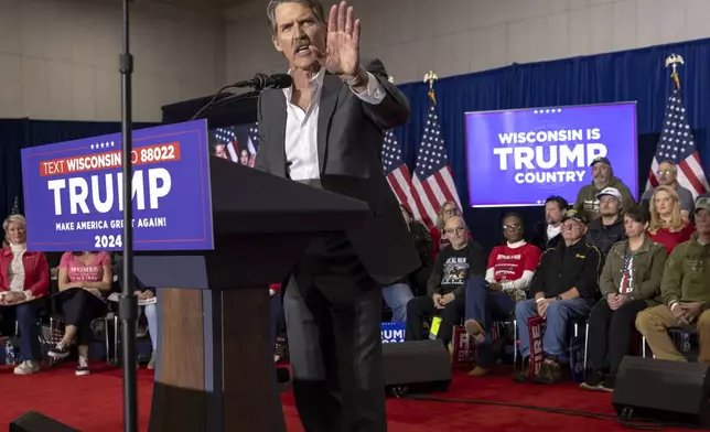 Madison, Wis., businessman and Republican U.S. Senate candidate, Eric Hovde speaks Tuesday April 2, 2024, at a former President Donald Trump rally in Green Bay, Wis. The Wisconsin Senate race between Democratic Sen. Tammy Baldwin and Republican Eric Hovde is setting up as one of the most competitive and expensive Senate races in the country. (AP Photo/Mike Roemer)