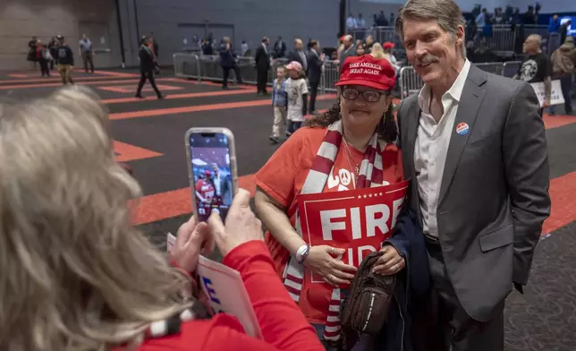 Madison, Wis., businessman and Republican U.S. Senate candidate, Eric Hovde poses for a photo, Tuesday April 2, 2024, at a former President Donald Trump rally in Green Bay, Wis. The Wisconsin Senate race between Democratic Sen. Tammy Baldwin and Republican Eric Hovde is setting up as one of the most competitive and expensive Senate races in the country. (AP Photo/Mike Roemer)