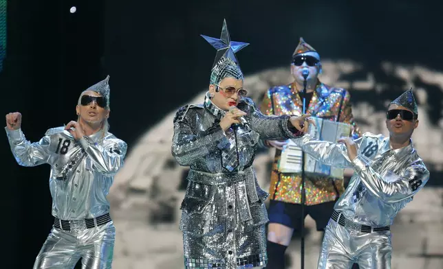 FILE - Ukraine's Verka Serduchka sings 'Dancing Lasha Tumbai' at a dress rehearsal for the 2007 Eurovision Song Contest, in Helsinki, Finland, May 12, 2007. The 68th Eurovision Song Contest is taking place in May in Malmö, Sweden. It will see acts from 37 countries vie for the continent’s pop crown. Founded in 1956, Eurovision is a feelgood extravaganza that strives to banish international strife and division. It’s known for songs that range from anthemic to extremely silly, often with elaborate costumes and spectacular staging. (AP Photo/Alastair Grant, File)