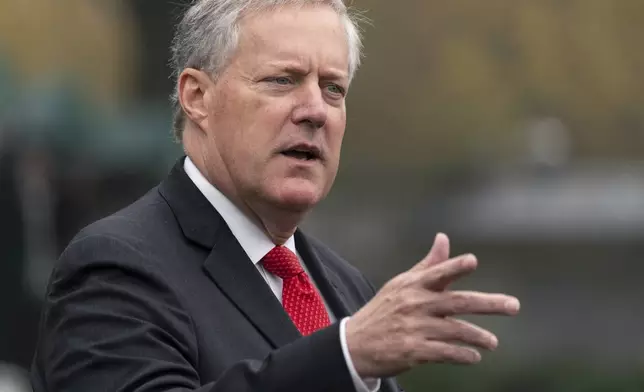 FILE - Mark Meadows speaks with reporters at the White House, Oct. 21, 2020, in Washington. Meadows, chief of staff for former President Donald Trump, was among those indicted Wednesday, April 24, 2024, in an Arizona election interference case. (AP Photo/Alex Brandon, File)
