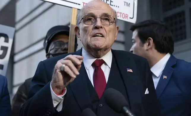 FILE - Former Mayor of New York Rudy Giuliani speaks during a news conference outside the federal courthouse in Washington, Dec. 15, 2023. Guiliani, a lawyer for former President Donald Trump, was among those indicted Wednesday, April 24, 2024, in an Arizona election interference case.(AP Photo/Jose Luis Magana, File)