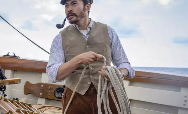 This image released by Lionsgate shows Henry Golding in a scene from the film "The Ministry of Ungentlemanly Warfare." (Daniel Smith/Lionsgate via AP)
