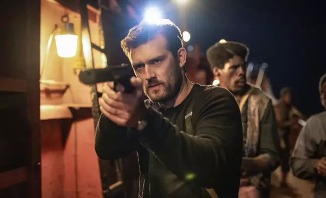 This image released by Lionsgate shows Alex Pettyfer in a scene from the film "The Ministry of Ungentlemanly Warfare." (Daniel Smith/Lionsgate via AP)