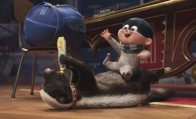 This image released by Illumination Entertainment and Universal Studios shows Honey Badger, left, voiced by Frank Welker, and Baby Gru, voiced by in a scene from "Despicable Me 4." (Illumination Entertainment and Universal Studios via AP)