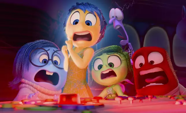 This image released by Disney/Pixar shows, from left, Sadness, voiced by Phyllis Smith, from left, Joy, voiced by Amy Poehler, Disgust, voiced by Liza Lapira, Fear, voiced by Tony Hale and Anger, voiced by Lewis Black in a scene from "Inside Out 2." (Disney/Pixar via AP)