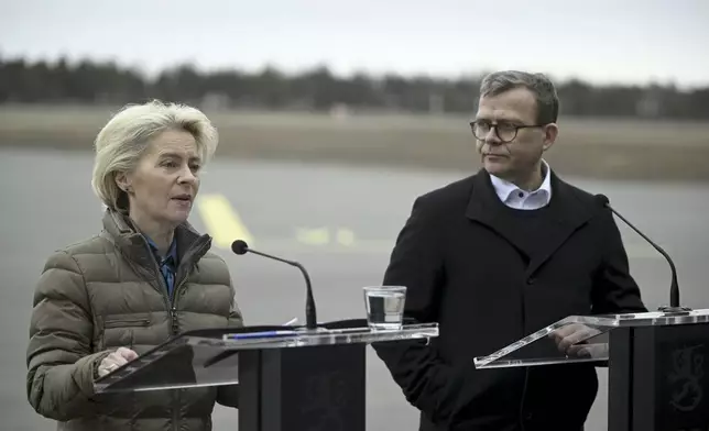 President of the European Commission Ursula von der Leyen, left, and Finnish Prime Minister Petter Orpo give a joint press conference at the Lappeenranta airport, eastern Finland, Friday April 19, 2024. President von der Leyen and Prime Minister Orpo visited the eastern border region of Finland on Friday and discussed what Finland and the EU can do to prevent instrumentalised migration to Finland's eastern border. (Antti Aimo-Koivisto/Lehtikuva via AP)