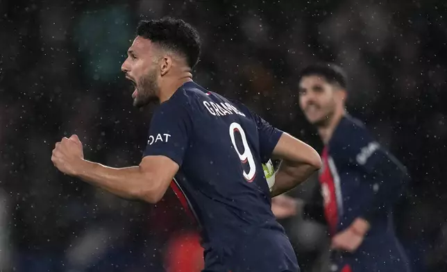 PSG's Goncalo Ramos celebrates after scoring his side's third goal during the French League One soccer match between Paris Saint-Germain and Le Havre at the Parc des Princes in Paris, Saturday, April 27, 2024. (AP Photo/Thibault Camus)