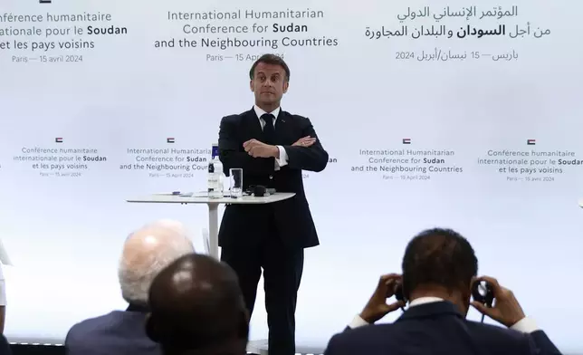 French President Emmanuel Macron attends a session at the international conference on Sudan, Monday, April 15, 2024 in Paris. Top diplomats and aid groups met in the French capital to drum up humanitarian support for Sudan after a yearlong war has devastated the northeastern African country and pushed its people to the brink of famine. (AP Photo/Aurelien Morissard; Pool)