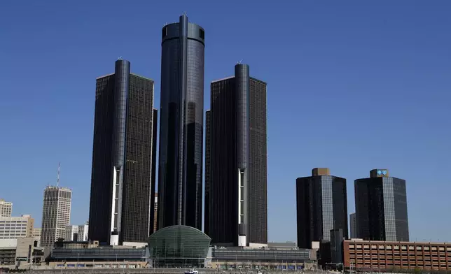 A general view of the Renaissance Center, headquarters for General Motors, is shown along the Detroit skyline from the Detroit River, Tuesday, May 12, 2020. (AP Photo/Paul Sancya)
