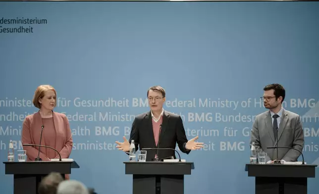 From left: German Minister for Family Affairs, Senior Citizens, Women and Youth, Lisa Paus, Health Minister Karl Lauterbach and Justice Minister Marco Buschmann attend a news conference following the presentation of a report an expert commission, tasked by the German government, to decriminalise the current abortion law, in Berlin, Monday, April 15, 2024. The independent experts commission recommended that abortion in Germany should no longer fall under the country's penal code but be made legal during the first 12 weeks of pregnancy. (AP Photo/Markus Schreiber)