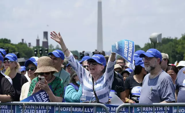 FILE - People attend the "NO FEAR: Rally in Solidarity with the Jewish People" event in Washington, on July 11, 2021, co-sponsored by the Alliance for Israel, Anti-Defamation League, American Jewish Committee, B'nai B'rith International and other organizations. More than 250 Holocaust survivors have joined an international initiative to share their stories of loss and survival with students around the world during a time of rising antisemitism following the Oct. 7 Hamas attack on Israel that triggered the war in the Gaza Strip. The Survivor Speakers Bureau was launched Thursday by the New York-based Conference on Jewish Material Claims Against Germany, also referred to as the Claims Conference. (AP Photo/Susan Walsh, File)