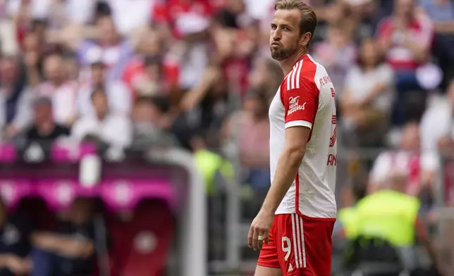 Bayern's Harry Kane reacts during the German Bundesliga soccer match between Bayern Munich and Cologne at the Allianz Arena in Munich, Germany, Saturday, April 13, 2024. (AP Photo/Matthias Schrader)