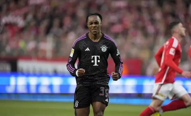 Bayern's Mathys Tel celebrates after scoring his side's fourth goal during the German Bundesliga soccer match between FC Union Berlin and Bayern Munich at the An der Alten Forsterei stadium in Berlin, Germany, Saturday, April 20, 2024. (AP Photo/Ebrahim Noroozi)