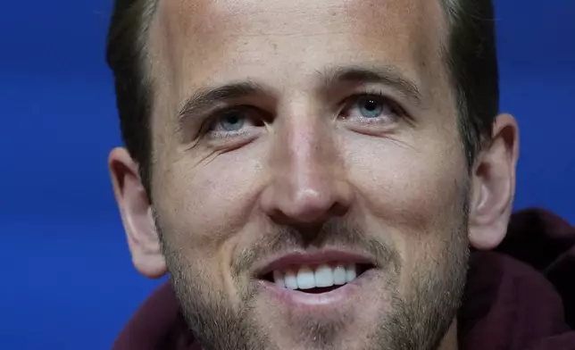 Bayern's Harry Kane attends a news conference in Munich, Germany, Tuesday, April 16, 2024, ahead of the Champions League quarter final second leg soccer match between FC Bayern Munich and Arsenal. (AP Photo/Matthias Schrader)