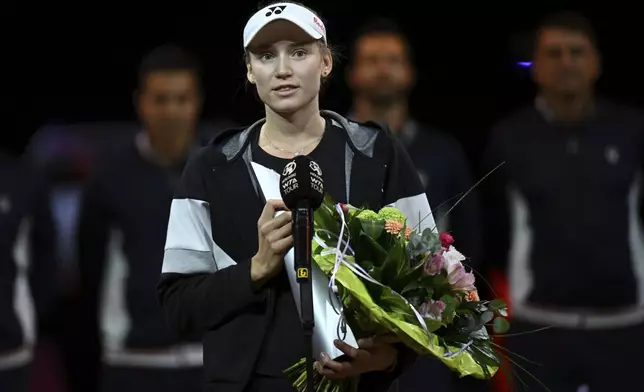 Kazakhstan's Elena Rybakina speaks after winning the Women Singles tennis tournament of Stuttgart, Germany, Sunday April 21, 2024. (Marijan Murat/dpa via AP)