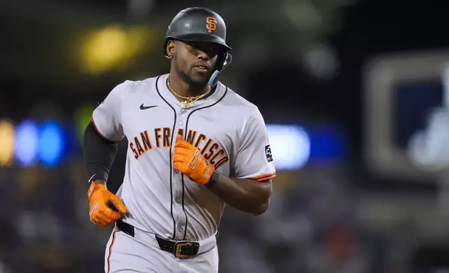 San Francisco Giants' Jorge Soler runs the bases on a home run during the sixth inning of the team's baseball game against the Los Angeles Dodgers, Tuesday, April 2, 2024, in Los Angeles. (AP Photo/Ryan Sun)