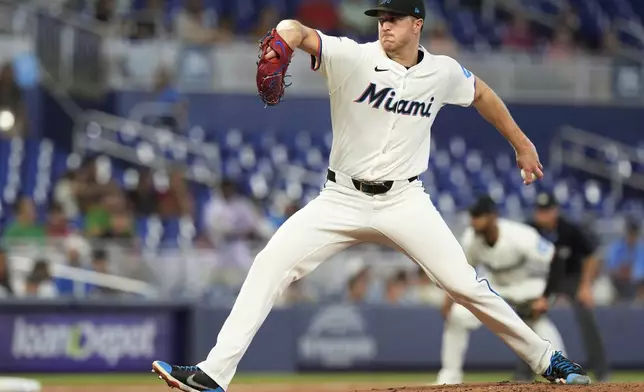 Miami Marlins starting pitcher Trevor Rogers aims a pitch during the third inning of a baseball game against the San Francisco Giants, Wednesday, April 17, 2024, in Miami. (AP Photo/Marta Lavandier)