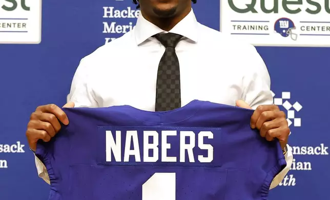 New York Giants first round draft pick Malik Nabers answers questions during an NFL football press conference, Friday, April 26, 2024, in East Rutherford, N.J. (AP Photo/Noah K. Murray)