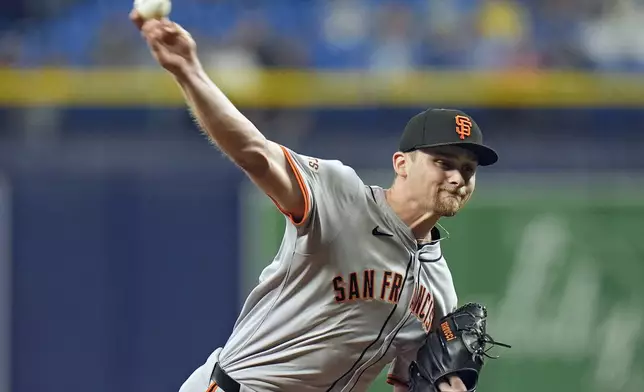 San Francisco Giants pitcher Keaton Winn delivers to the Tampa Bay Rays during the first inning of a baseball game Friday, April 12, 2024, in St. Petersburg, Fla. (AP Photo/Chris O'Meara)