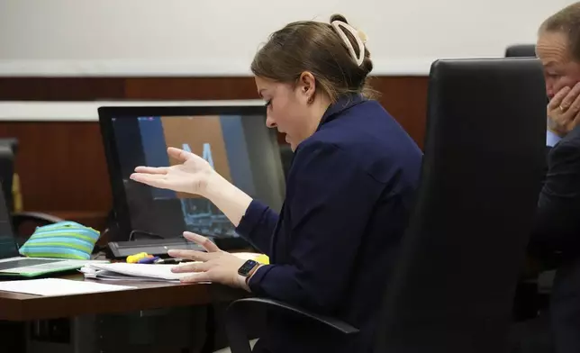 Waukesha County Deputy District Attorney Abbey Nickolie questions Dr. Brooke Lundbohm, PhD, a specialist in psychology, during a motion hearing for Morgan Geyser in Waukesha County Circuit Court on Wednesday, April 10, 2024, in Waukesha, Wis. Two psychologists testified Wednesday that Geyser, who at age 12 stabbed a sixth-grade classmate nearly to death to please the online horror character Slender Man, should not be released yet from a psychiatric hospital. (Scott Ash/Milwaukee Journal-Sentinel via AP)
