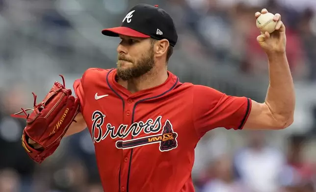 Atlanta Braves pitcher Chris Sale (51) delivers against the Cleveland Guardians during the first inning of a baseball game, Friday, April 26, 2024, in Atlanta. (AP Photo/Mike Stewart)