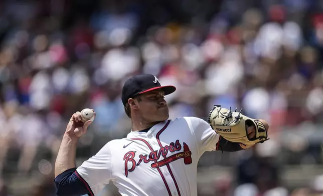 Atlanta Braves pitcher Bryce Elder delivers in the first inning of a baseball game against the Cleveland Guardians, Sunday, April 28, 2024, in Atlanta. (AP Photo/Mike Stewart)