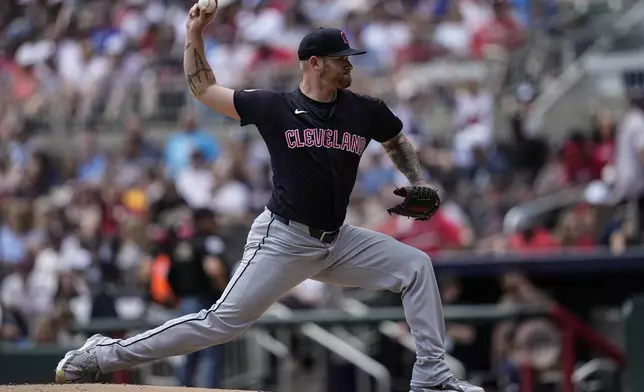 Cleveland Guardians pitcher Ben Lively (39) delivers in the first inning of a baseball game against the Atlanta Braves, Sunday, April 28, 2024, in Atlanta. (AP Photo/Mike Stewart)