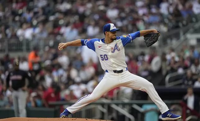 Atlanta Braves pitcher Charlie Morton (50) works in the first inning of a baseball game against the Cleveland Guardians, Saturday, April 27, 2024, in Atlanta. (AP Photo/Mike Stewart)