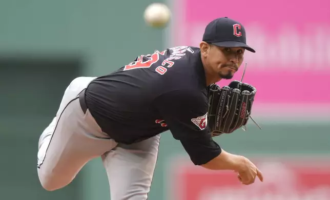 Cleveland Guardians' Carlos Carrasco delivers a pitch to a Boston Red Sox batter in the first inning of a baseball game, Thursday, April 18, 2024, in Boston. (AP Photo/Steven Senne)