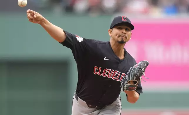 Cleveland Guardians' Carlos Carrasco delivers a pitch to a Boston Red Sox batter in the first inning of a baseball game, Thursday, April 18, 2024, in Boston. (AP Photo/Steven Senne)