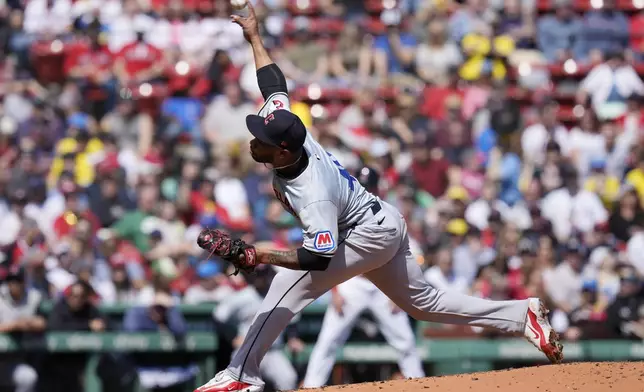 Cleveland Guardians' Xzavion Curry pitches against the Boston Red Sox during the first inning of a baseball game, Monday, April 15, 2024, in Boston. (AP Photo/Michael Dwyer)
