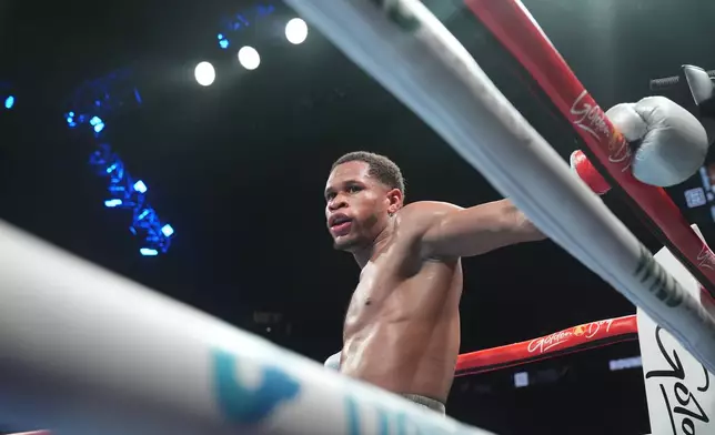 Devin Haney pauses after being knocked down during the seventh round of a super lightweight boxing match against Ryan Garcia ealry Sunday, April 21, 2024, in New York. Garcia won the fight. (AP Photo/Frank Franklin II)