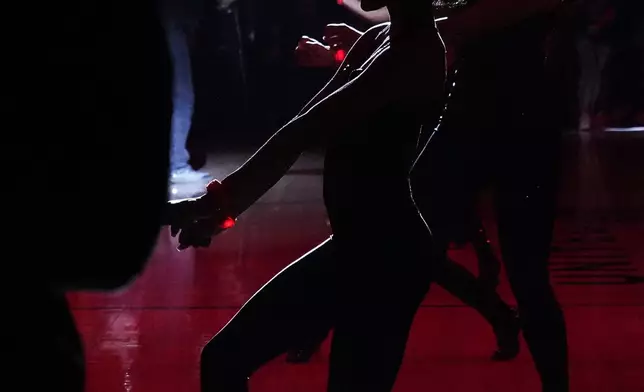 Members of the Chicago Luvabulls perform before an NBA basketball game between the Atlanta Hawks and the Chicago Bulls in Chicago, Monday, April 1, 2024. (AP Photo/Nam Y. Huh)