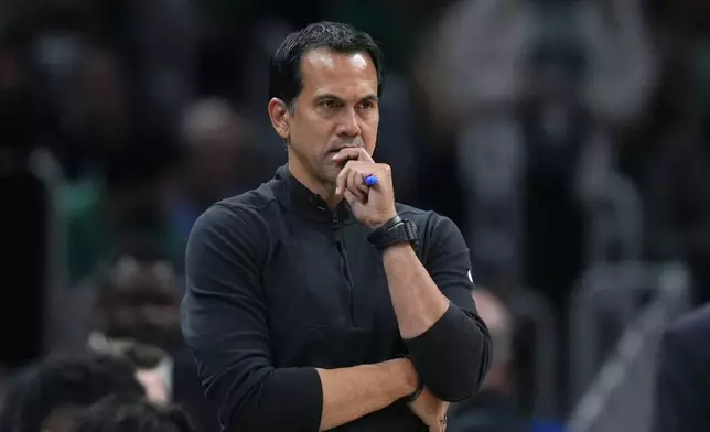 Miami Heat head coach Erik Spoelstra watches from the bench in the second half of Game 1 of an NBA basketball first-round playoff series against the Boston Celtics, Sunday, April 21, 2024, in Boston. (AP Photo/Steven Senne)