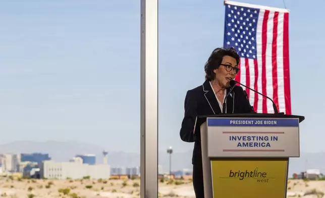 Sen. Jacky Rosen, D-Nev., speaks at the groundbreaking for a high-speed passenger rail on Monday, April 22, 2024, in Las Vegas. A $12 billion high-speed passenger rail line between Las Vegas and the Los Angeles area has started construction. (AP Photo/Ty ONeil)