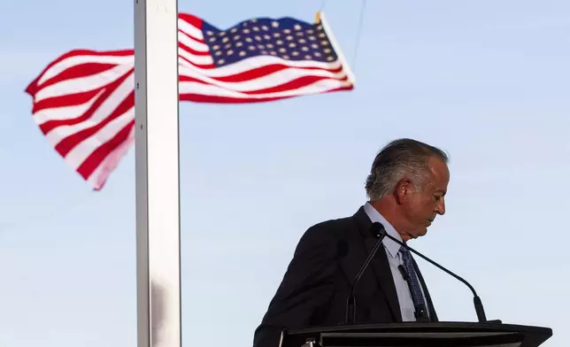 Nevada Governor Joe Lombardo leaves the stage at a groundbreaking for a high-speed passenger rail on Monday, April 22, 2024, in Las Vegas. A $12 billion high-speed passenger rail line between Las Vegas and the Los Angeles area has started construction. (AP Photo/Ty ONeil)
