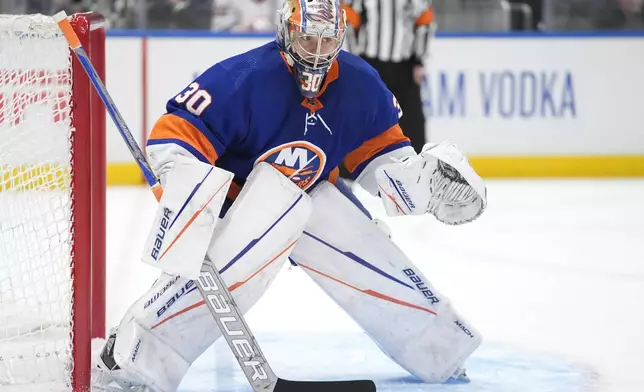 New York Islanders goaltender Ilya Sorokin protects the net during the first period of Game 3 of the team's NHL hockey Stanley Cup first-round playoff series against the Carolina Hurricanes, Thursday, April 25, 2024, in Elmont, N.Y. (AP Photo/Frank Franklin II)