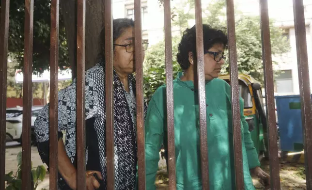 Leaders from India's Trinamool Congress political party, Dola Sen, left, and April Ghosh, talk to the media after being detained while protesting outside the Election Commission's office, in New Delhi, India, Tuesday, April 9, 2024.(AP Photo/Dinesh Joshi)