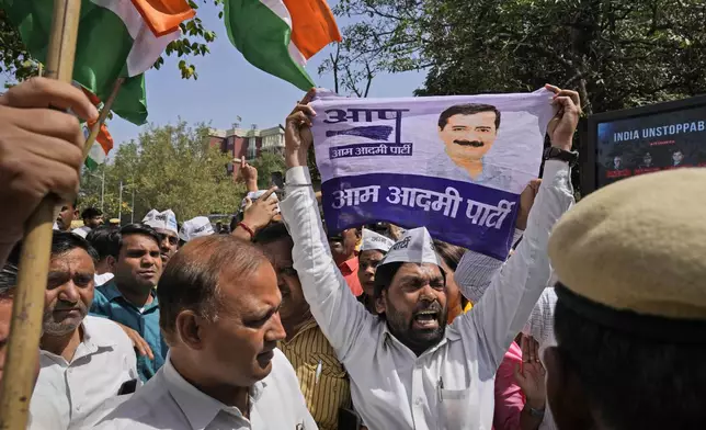 Supporters of the Aam Aadmi Party protest against the arrest of their party leader in New Delhi, India, March 26, 2024. India's ruling Bharatiya Janata Party has brought corruption charges against many officials from opposition parties, but few convictions. (AP Photo/Manish Swarup)