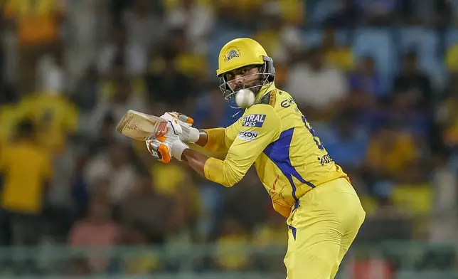 Chennai Super Kings' Ravindra Jadeja watches the ball after playing a shot during the Indian Premier League cricket match between Chennai Super Kings and Lucknow Super Giants in Lucknow, India, Friday, April 19, 2024. (AP Photo/Surjeet Yadav)