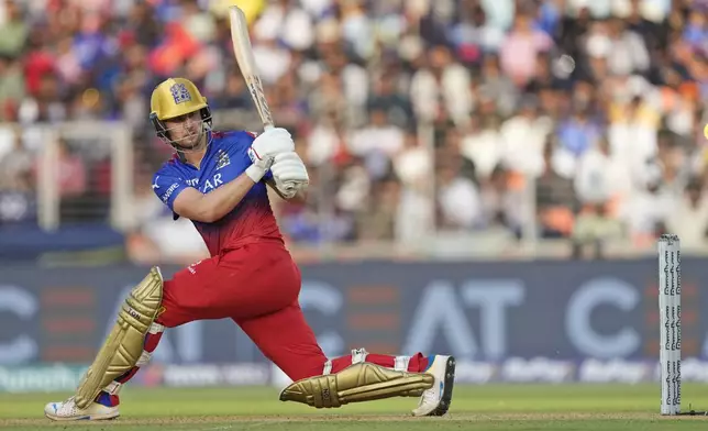 Royal Challengers Bengaluru's Will Jacks bats during the Indian Premier League cricket match between Gujarat Titans and Royal Challengers Bengaluru in Ahmedabad, India, Sunday, April 28, 2024. (AP Photo /Ajit Solanki)