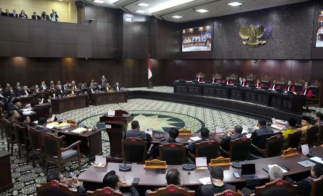 Judges preside over a hearing on the presidential election result dispute at the Constitutional Court in Jakarta, Indonesia, Friday, April 5, 2024. (AP Photo/Dita Alangkara)